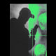 Photo illustration of two silhouettes using phones 